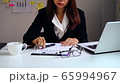 Stressed business woman suffering from back pain, Office syndrome concept	 65994967