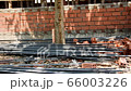 Blue collar worker taking a break at noon. Close up of women eating bread and reading a letter on 66003226