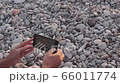 People taking photo or recording video on smartphone 66011774