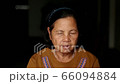 An Asian senior woman feel sleepy. 66094884