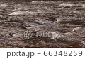 Close-Up of a river flowing over rocks causing mild rapids 66348259