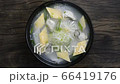 Oysters Soup with egg and radish Korean Food Style (Gulguk) refreashingly clear dish decorate with leek topview 66419176