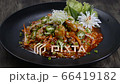 Oysters Freash Salad Gul-Muchim Seasoned Korean Food Style dish decorate with vegetables and leek sideview 66419182