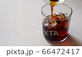 Stock Footage: pouring iced coffee into a glass 66472417