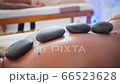 back massage and spine therapy with hot stones back massage and spine therapy with hot stones 66523628