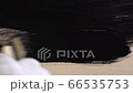 Stock Footage: Painting with a brush on a board (overview) 66535753