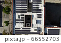 Solar installation project on commercial building roof, California, aerial 66552703