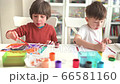 Kid Painting at Kindergarten 66581160