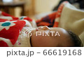 A baby who repeats unconsciously sucking while sleeping 66619168