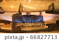 [Close-up of gas stove flame] Kettle/pot over high heat 66827713