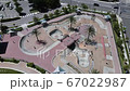 Aerial orbit view, skate park of young kids riding bikes and skateboards 67022987
