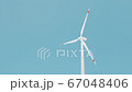 Wind turbine against bright blue sky, Power environmental technology industry, 3d illustration. 67048406
