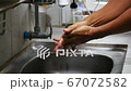 Hand washing with soap, Coronavirus (Covid-19) pandemic prevention outbreak. Rubbing nails, fingers,backhanded and wrist. Hygiene to stop spreading germs and bacteria. Health - cleanliness concept. 67072582