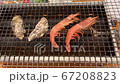 Grilled oysters and shrimps 67208823
