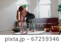 Slim Girl Make Yoga .Posing at Home on Carpet in Modern Apartment. 67259346