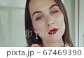 Young happy woman 67469390