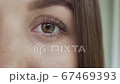Beautiful woman eye close-up 67469393
