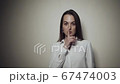 Woman asks for silence 67474003