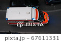 Ambulance vehicle with flashing blue ligths 67611331