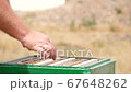Beekeeper's Work on the Apiary is Over 67648262