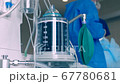 Close-up of a ventilator during an operation, FullHD shot. The movement is remembered by artificial lung ventilation, amid a ward with a patient and doctors. Pneumonia and tuberculosis, Covid 19 67780681