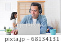 Asian father work at home with kids playing and dancing in living room 68134131