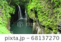 Manai Falls and fresh greenery in Takachiho Gorge 68137270