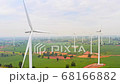 Group of wind turbines on wind farm mountain field, drone aerial view 68166882