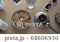 Cinemagraph Cup With Hot Fresh Brewed Coffee And Cookies On Table, Seamless Loop 68606930
