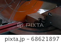 Circular electric saw closeup slow motion footage. Woodworking tools. End saw on a tree 68621897