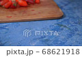 Berries of juicy red strawberries on a wooden board. The concept of a healthy diet, fruits and vitamins. Healthy breakfast. 68621918