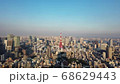 『タイムラプス』東京都港区六本木の高層ビルの展望台から見た東京の都市景観の動画素材 [68629443]