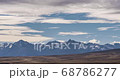 Timelapse of moving clouds over the mountains at Lake Tekapo, New Zealand 68786277