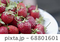 Rotating plate with ripe strawberry. High resolution video with vegetarian food full of vitamins 68801601