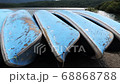 Old boats lined up next to lake Saiko in Japan. 68868788