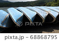 Old boats lined up next to lake Saiko in Japan. 68868795