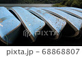 Old boats lined up next to lake Saiko in Japan. 68868807
