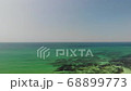 Emerald sea and white sand 68899773