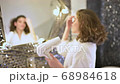 Sensual Woman Using Hair Dryer  68984618