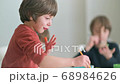 Kid Painting at Kindergarten 68984626