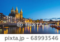 Amsterdam cityscape with view of canal and church 4K night time lapse. 68993546
