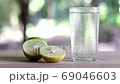 Fresh soda lemon in a Glass with Lemon Slices. Soda lemon juice. 69046603