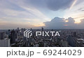 Day to Night Time lapse of aerial view over Bangkok city downtown and road traffic 69244029