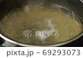 Inside the pot boiling the pasta 69293073