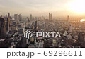 Day to Night Time lapse of aerial view over Bangkok city downtown and road traffic 69296611