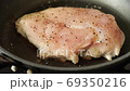 Grilled chicken breast meat in a frying pan 69350216