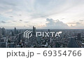Day to Night Time lapse of aerial view over Bangkok city downtown and road traffic 69354766