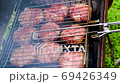 BBQ. Delicious juicy meat chops are fried on the wire rack 69426349