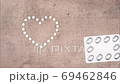 Stop motion of drugs and a heart made of tablets 69462846