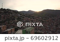 Aerial View of Sunset Above Hillside Slum Favela Buildings in Medellin Colombia 69602912